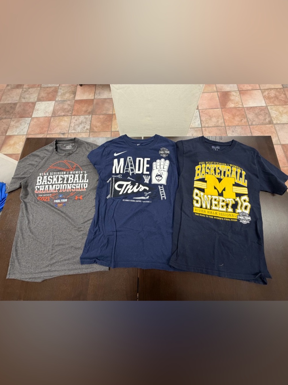 Three small 2021 women’s basketball shirts